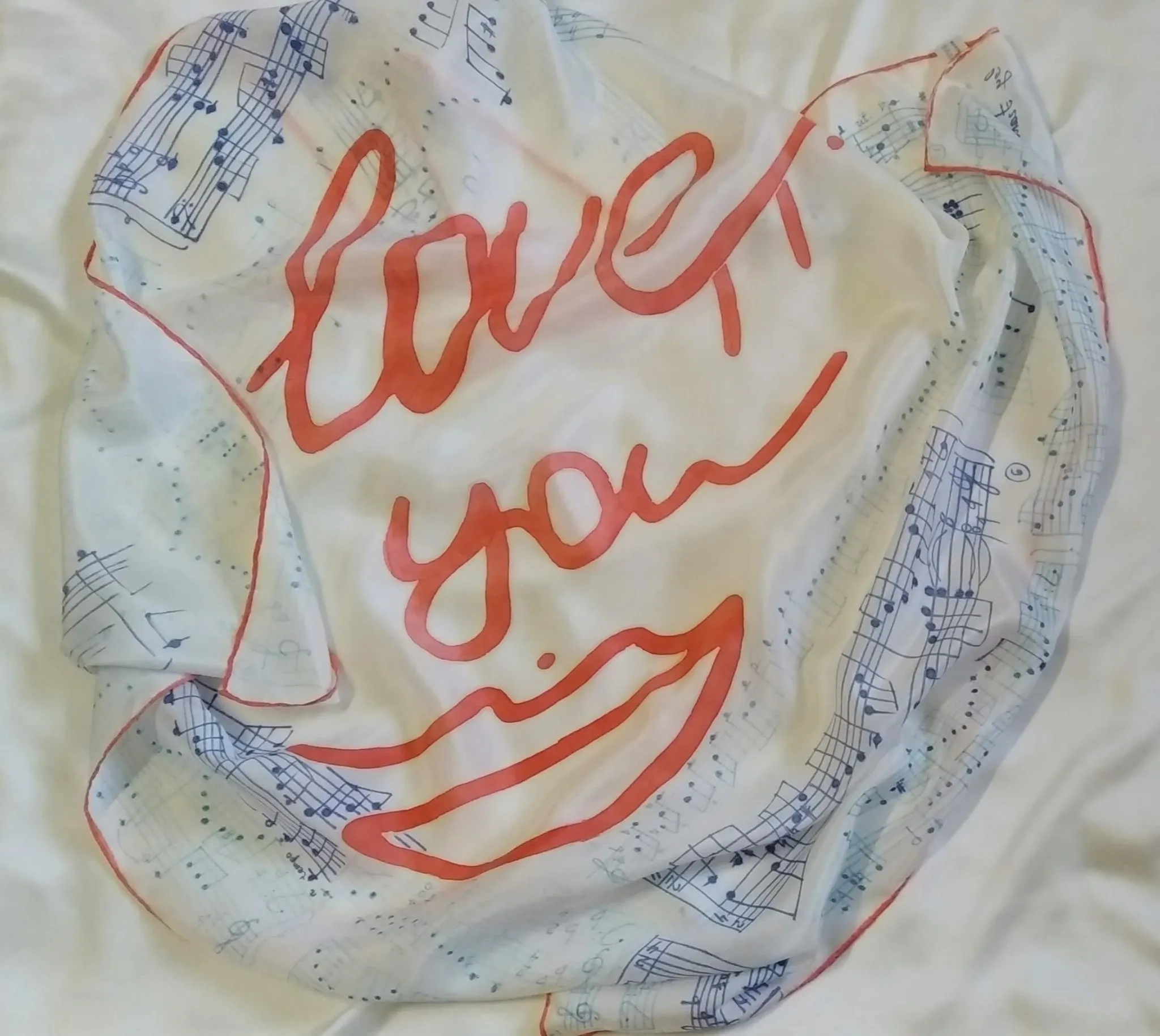 Image of Scarf "Love story. Music by Frаncis Lay" by Tetiana Kononenko (Tanta), size: 89х89 см, made of silk 100%, acrylic for silk, resist, textile marker, batik medium, part of the "Batik" series Photo 5 of 5.